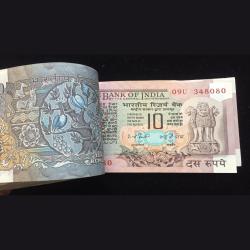 Alternative view of I.G.Patel ( Plaine Insert) peacock 🦚 10 rupees serial packet Last note pin Removed 100 note