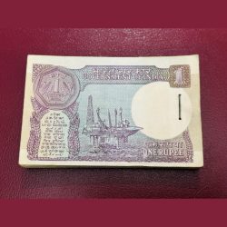 Alternative view of 1rs serial bundle 73F 453501 to 453600 signed by venkataraman with year 1986