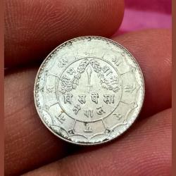 Alternative view of NEPAL SILVER Coinage Weight 3.4 Grams. Denomination 20 Paisa **SCARE** UNC Grade.