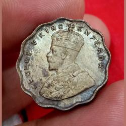 Alternative view of British India ONE ANNA Cu/Ni Year 1935 King GEORGE-V **SCARE** UNC Grade with Original Mint Luster