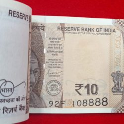 Alternative view of 10 rupees note packet 108 number holy number serial number 108801
