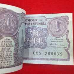 Alternative view of One rupees packet starting 786 and reverse 786 UNC condition serial no. 00N 786801
