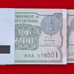 One rupees packet 2018 A-63 Subhash Chandra Garg. Seial no. 078501