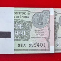 One rupee packet issue 2020 semi fancy number 535455 serial no. 535401