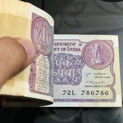 Extremely Rare issue 1rs Bundle with number 786 786 signed by narsimha