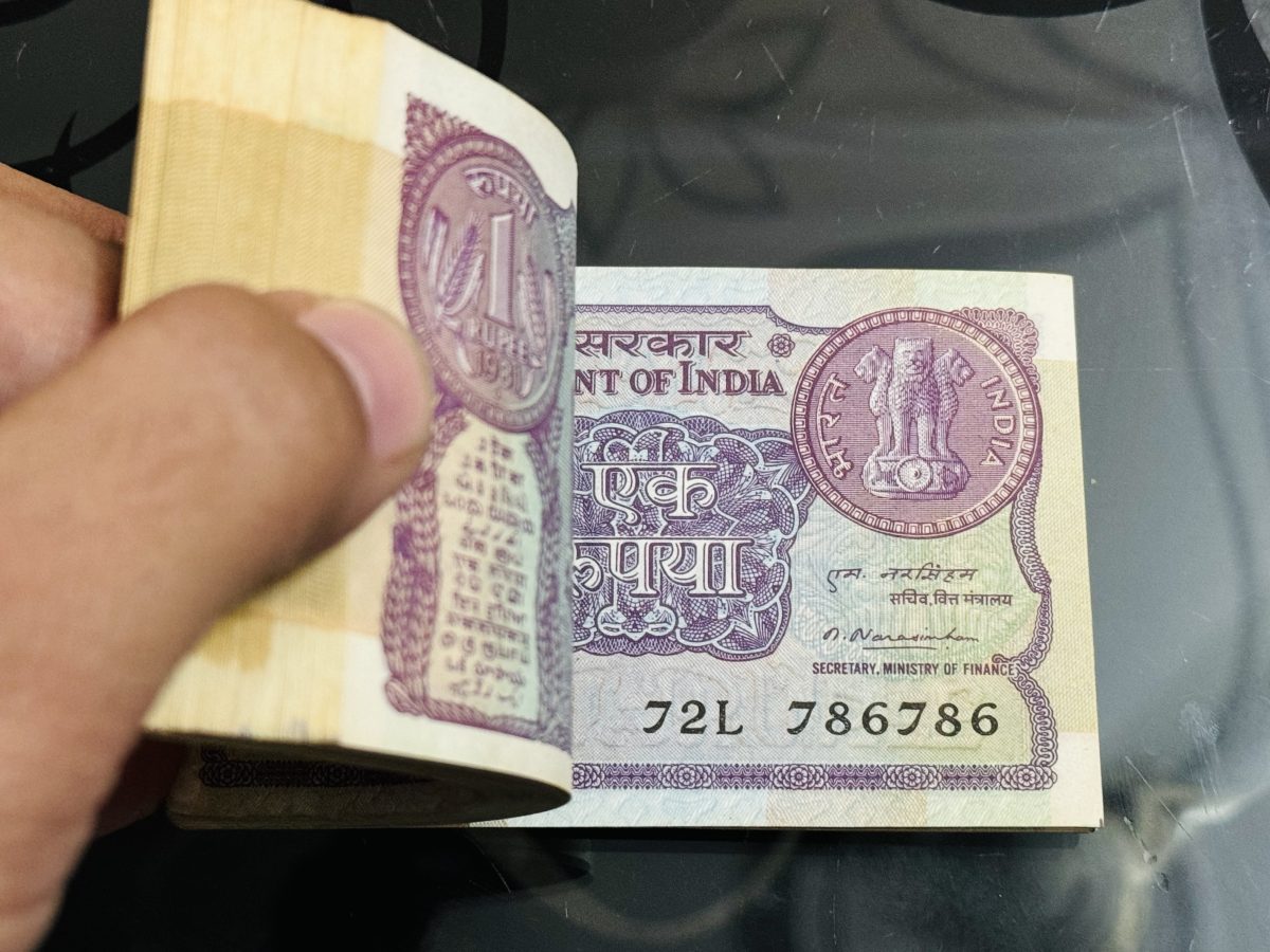 Extremely Rare issue 1rs Bundle with number 786 786 signed by narsimha