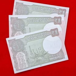 Alternative view of one rupee three note set UNC condition prefix 44 serial no. 444441,444442,444443