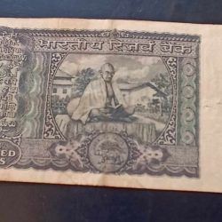 Alternative view of Reserve Bank of India 100₹ note Backside of Gandhi Governor l k Jha