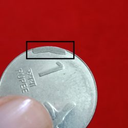 Alternative view of One Rs Mudra Issue Extra Metal Coin Rare Error 2009 Year Noida