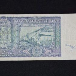 Alternative view of 100 RUPEES NOTE G-16 I. G. PATEL RELEASED ON 1977 SERIAL NUMBER 408930