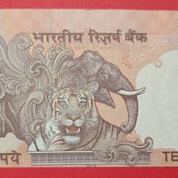 Alternative view of 10 Rs Error Note Serial Shifting and Year Shifted on both Side with Extra Paper Cut on top of Note and Condtion GEM UNC