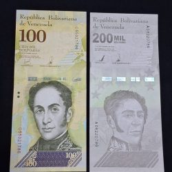 VENENZULA 100 AND 200 BOLIVARIES ENDING 786 GEM UNC CONDITION
