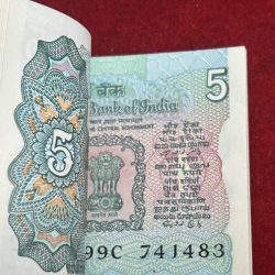 Alternative view of 5 Rupees Tractor Issue with out pin Holl Governor Bimal Jalan Serial Gem chocolate Packet