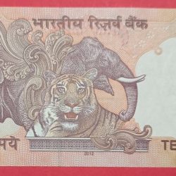 Alternative view of 10 Rs Old Issue Star Note with Serial Shifting Error