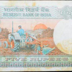 5 Rupees of Republic India (AD 1988) with Farmer ploughing with a tractor while sun is rising - S. Venkatiramanan Signature