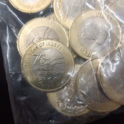 Alternative view of Ten Rs Akam Scare Coin Year 2023 Calcutta Mint RBI Sealed Packet 25 Pcs Pkt