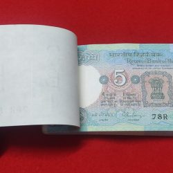 Alternative view of RARE ERROR UNIFACE NOTE NUMBER 590323 PACKET FIVE RUPEE SERIAL NO. 590301