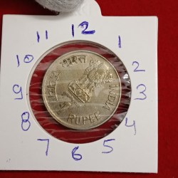 Alternative view of One Rs Scare Coin Copper Nickel ICDS 1"o Clock Hyderabad Mint RBI Mistake Coin