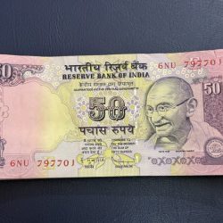 50rs rare issue serial bundle with doubling or ending 786 of year 2009 E inset with little cut on first note on above right side