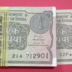 Alternative view of 1 Rs GEM UNC Bundle and its a star Bundle Last note with Star