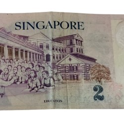 Alternative view of SINGAPORE Bank Note POLYMER Issue TWO DOLLARS on Importance of Education Collectable Grade.