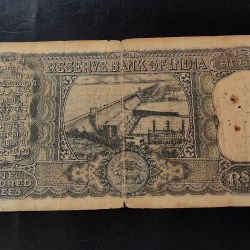 Alternative view of Reserve Bank of India Rs 100 note Signature of PC. Bhattacharya Diamond issue Condition as imege Same and similar piece available