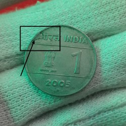 Alternative view of One Rs Croos 2005 Year Error Coin 2 Pcs Given Hyderabad Mint RBI Mistake Coin