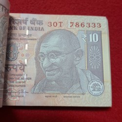 Alternative view of 10 Rupee Packet Starting 786 GEM UNC Condition Serial No. 786301