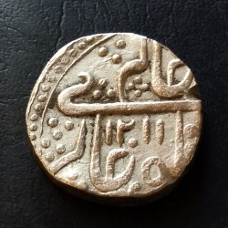 Alternative view of PRINCELY STATE Indore, Ahalya Bai (AH 1179-1210/1765-1795 AD), Maheshwar mint, Silver Rupee, 1207 AH, In the name of Shah Alam II, Obv: king title, Rev: bilva leaf, lingam, manus maimanat sanah julus, 11.30g, 21.08mm, about extremely fine Rare. Same and similar piece available