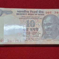 10 Rupee Packet Starting 786 GEM UNC Condition Packet Serial No. 30T 786201