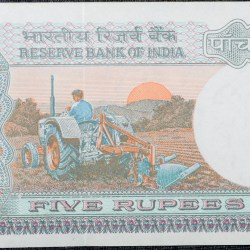 5 Rupees of Republic India (AD 1988) with Farmer ploughing with a tractor while sun is rising - S. Venkitaramanan Signature