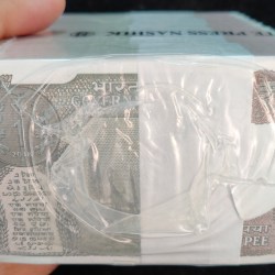 Alternative view of 2018 one ruppes seeled pack Rim 1000 note Rare date