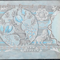 10 Rupees of Republic India (AD 1970-1990) with Two blue peacocks or Indian peafowl (Pavo cristatus) sitting on branches of an old mango tree surrounded by antelopes, horses, flowers, and a bird - R.N. Malhotra