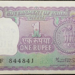 1 Rupee of Republic India (AD 1978) Manmohan Singh Signature with Violet color. Smaller watermark window and numbers to the left. Large ornamental 1 in the centre