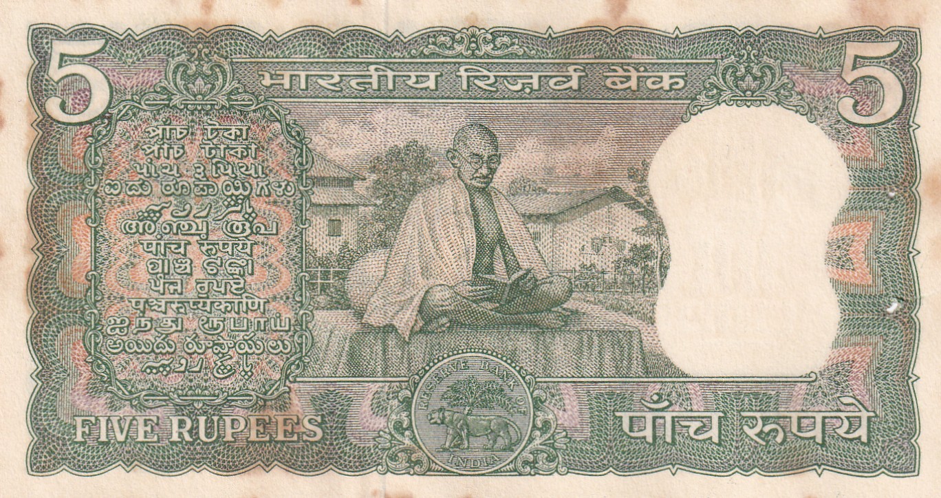 5 RUPEES GANDHI GOVERNOR LAXMI KANT UNC BUT STAIN NOTE