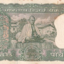 5 RUPEES GANDHI GOVERNOR LAXMI KANT UNC BUT STAIN NOTE