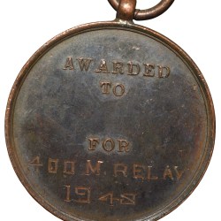 Alternative view of Bronze Medal of University of Bombay (AD 1948) Inter-College Sports - Relay 400 Meters