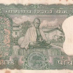 5 RUPEES GANDHI GOVERNOR LAXMI KANT UNC BUT STAIN NOTE