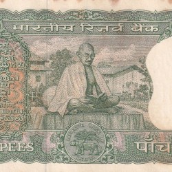 5 RUPEES GANDHI GOVERNOR LAXMI KANT UNC BUT STAIN NOTE
