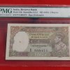 FIVE RUPEES NOTE KING GEORGE VI BRITISH INDIA GOVERNOR C. D. DESHMUCK PMG GRADED UNC CONDITION 63 GRADED SEMI FENCY NUMBER 888475