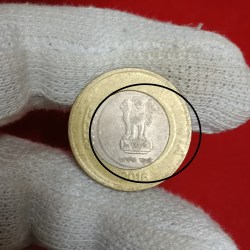 Alternative view of Ten Rs Ring Double Strike Shifted RBI Mistake Error Coin 2016 Year