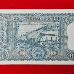 Alternative view of 100 RUPEES NOTE G -9 L. K. JHA RELEASED ON 1967 UNC CONDITION WITH PIN HOLE SERIAL NUMBER 391521