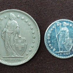 2 Different Switzerland 1 Franc Helvetia standing and A.G. Sigg Rare (2 Coin Set) #E-200