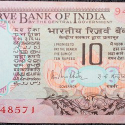 10 Rupees of Republic India (AD 1970-1990) with Two blue peacocks or Indian peafowl (Pavo cristatus) sitting on branches of an old mango tree surrounded by antelopes, horses, flowers, and a bird - R.N. Malhotra
