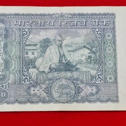 Alternative view of 100 Rupee Note Gandhi Issue L.K. JHA Serial No. 001780 SKU DG