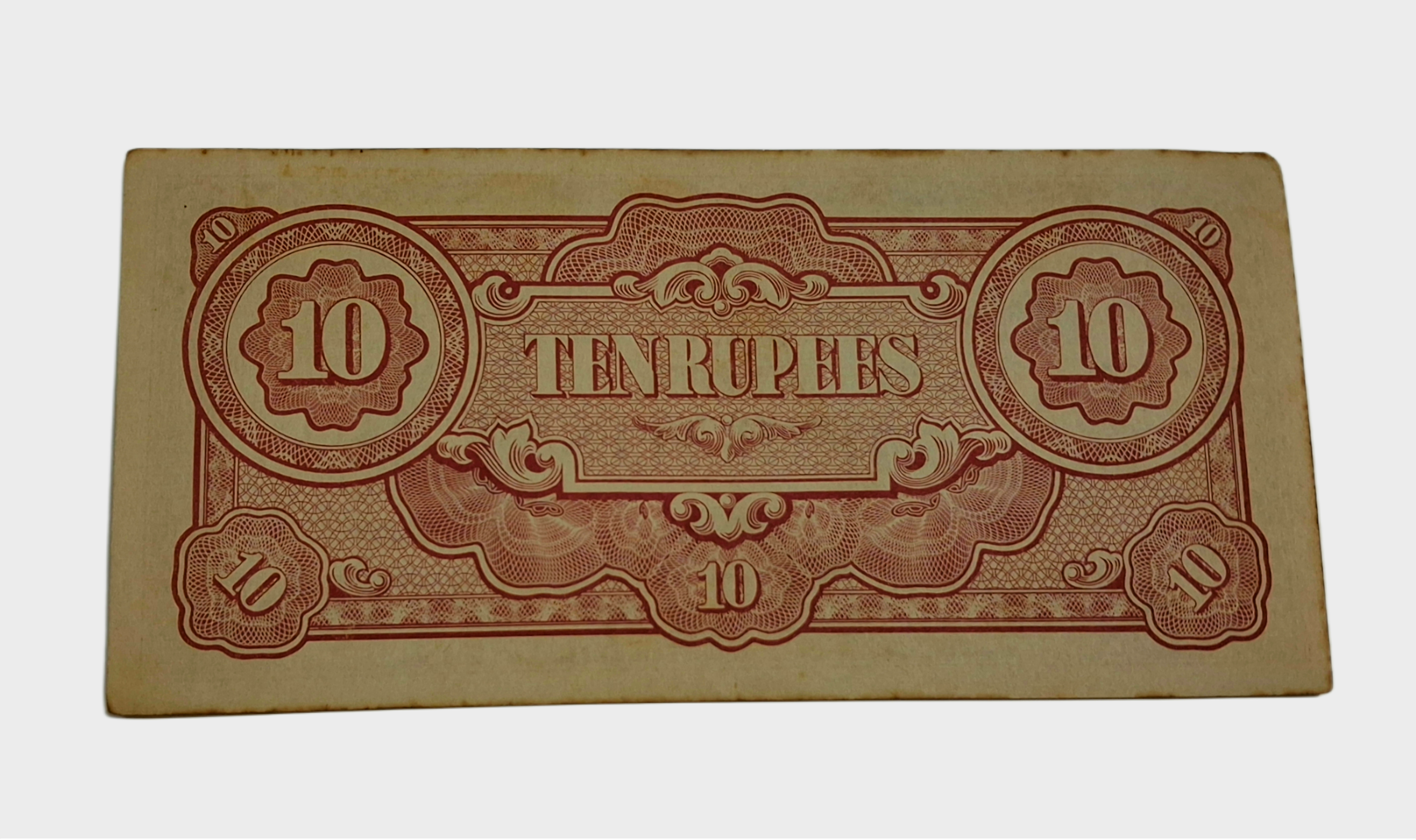 Japan 10 Rupees [Burma Occupied] Featuring Ananda Temple **Scare** Bank Note in High Collectable AUNC Grade.