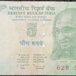5 Rupees of Republic India (AD 2010) with Farmer ploughing with a tractor while sun is rising - D.Subba Rao Signature