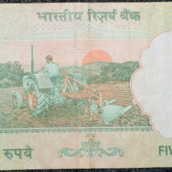 Alternative view of 5 Rupees of Republic India (AD 2010) with Farmer ploughing with a tractor while sun is rising - D.Subba Rao Signature
