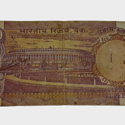 Alternative view of 50 Rupees Old Parliament WITHOUT FLAG Issue Sign I.G PATEL in Used Condition.
