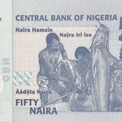 Alternative view of Polymer 50 Naira of Nigeria (AD 2025) with Nigerians, varied citizenry/Fishermen with big catch